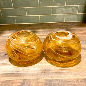 MCM Beautiful hand blown glass 2 votive globes. Gold w/ white swirls